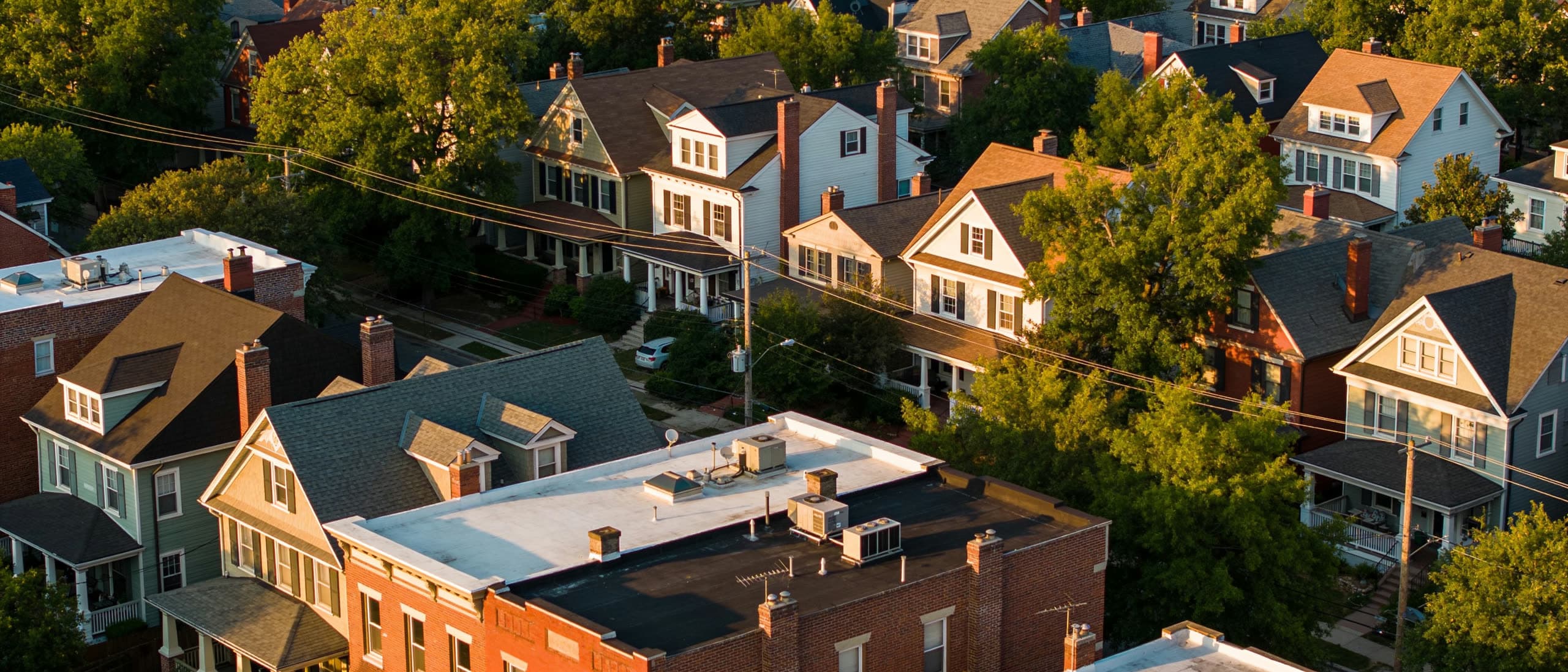 Aerial view over an intown Atlanta neighborhood at golden hour